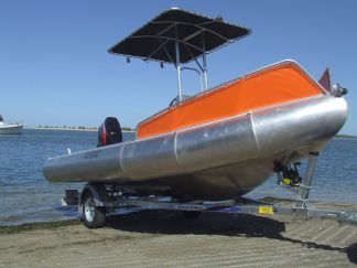 The 5.2 Ocean Craft Chinook.  This hull is rated for 10 people and will transport 2.2 tonnes.